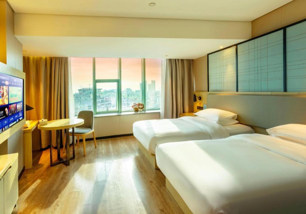 Echarm Hotel Yangjiang Baili Plaza Exterior photo