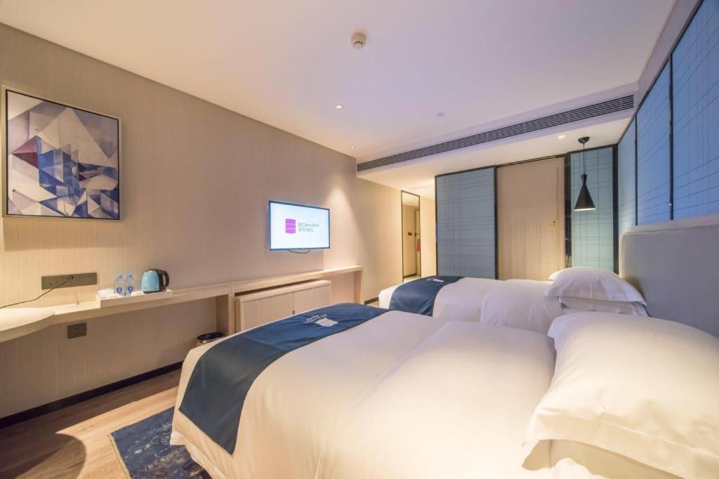 Echarm Hotel Yangjiang Baili Plaza Exterior photo