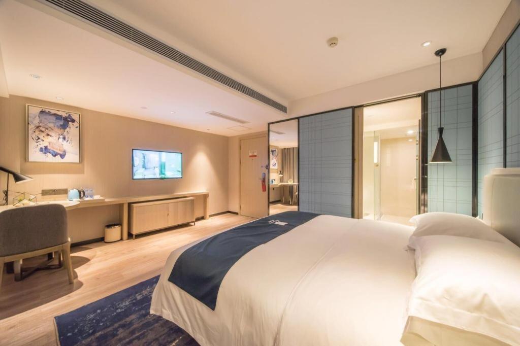 Echarm Hotel Yangjiang Baili Plaza Exterior photo