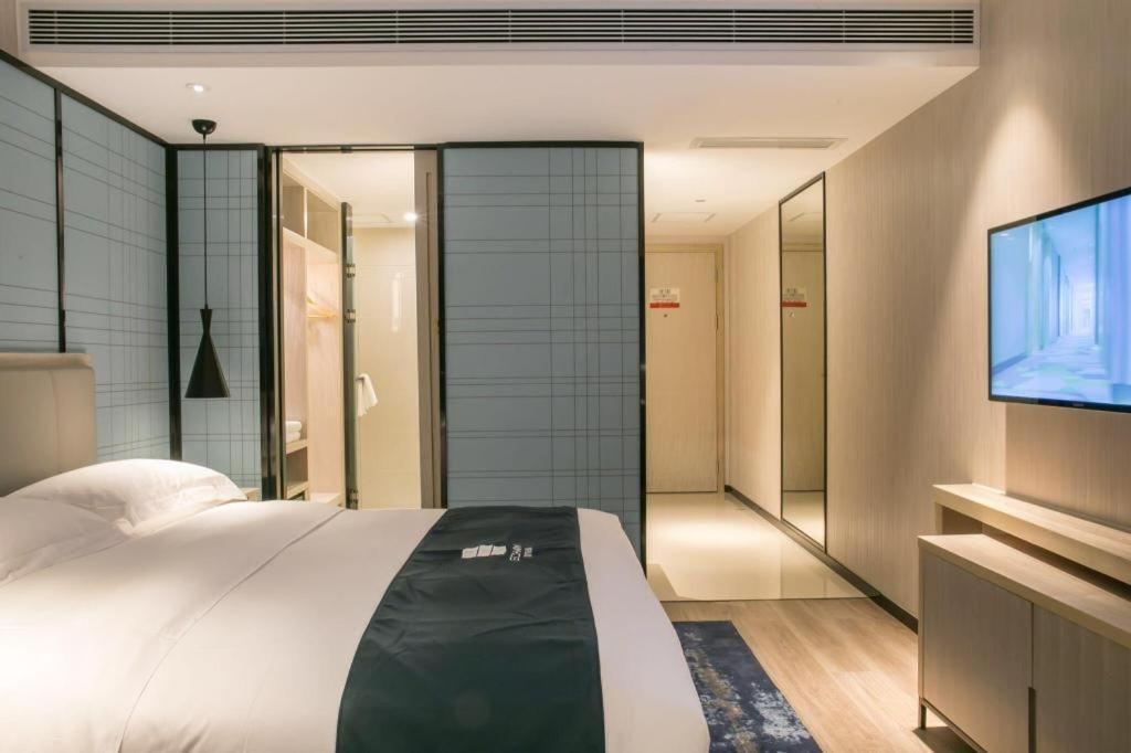 Echarm Hotel Yangjiang Baili Plaza Exterior photo