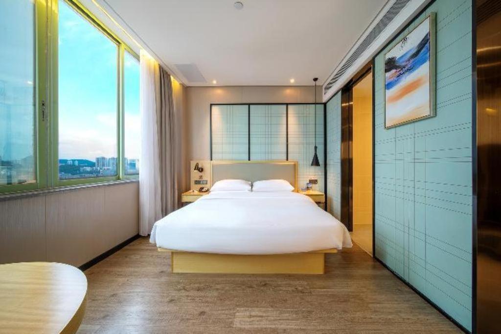 Echarm Hotel Yangjiang Baili Plaza Exterior photo