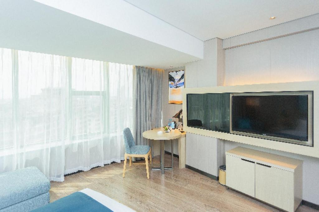 Echarm Hotel Yangjiang Baili Plaza Exterior photo