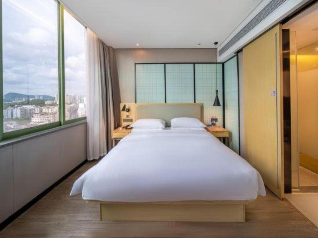 Echarm Hotel Yangjiang Baili Plaza Exterior photo