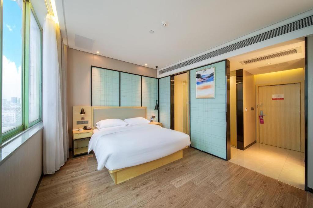 Echarm Hotel Yangjiang Baili Plaza Exterior photo