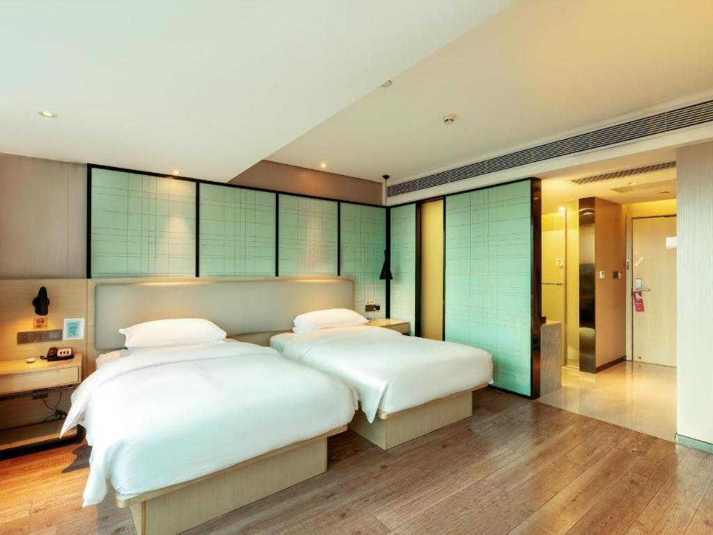 Echarm Hotel Yangjiang Baili Plaza Exterior photo